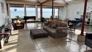 Cardy Net House Wohnzimmer mit Meerblick